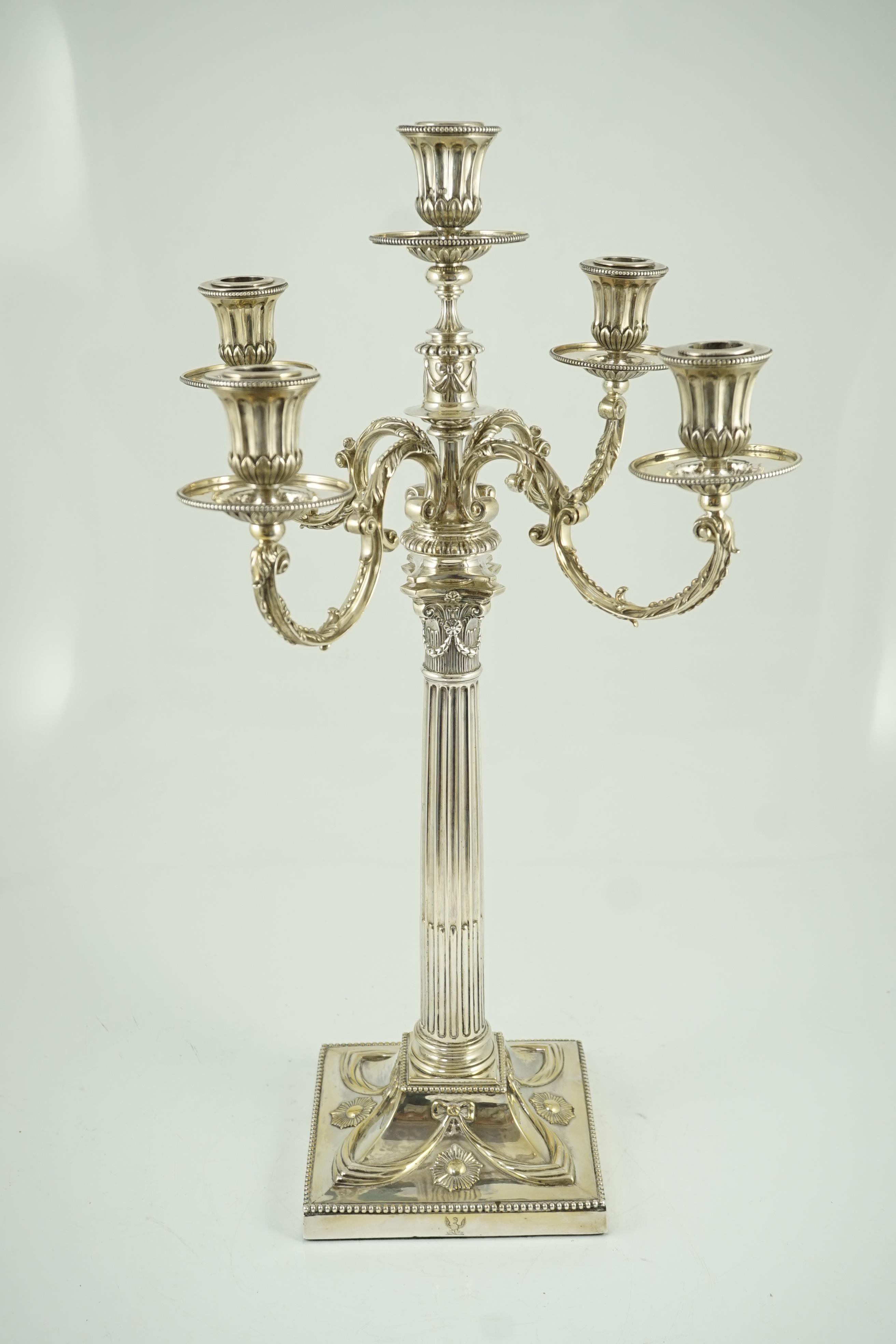 A good Victorian silver four branch, five light candelabrum, by R & S Garrard & Co